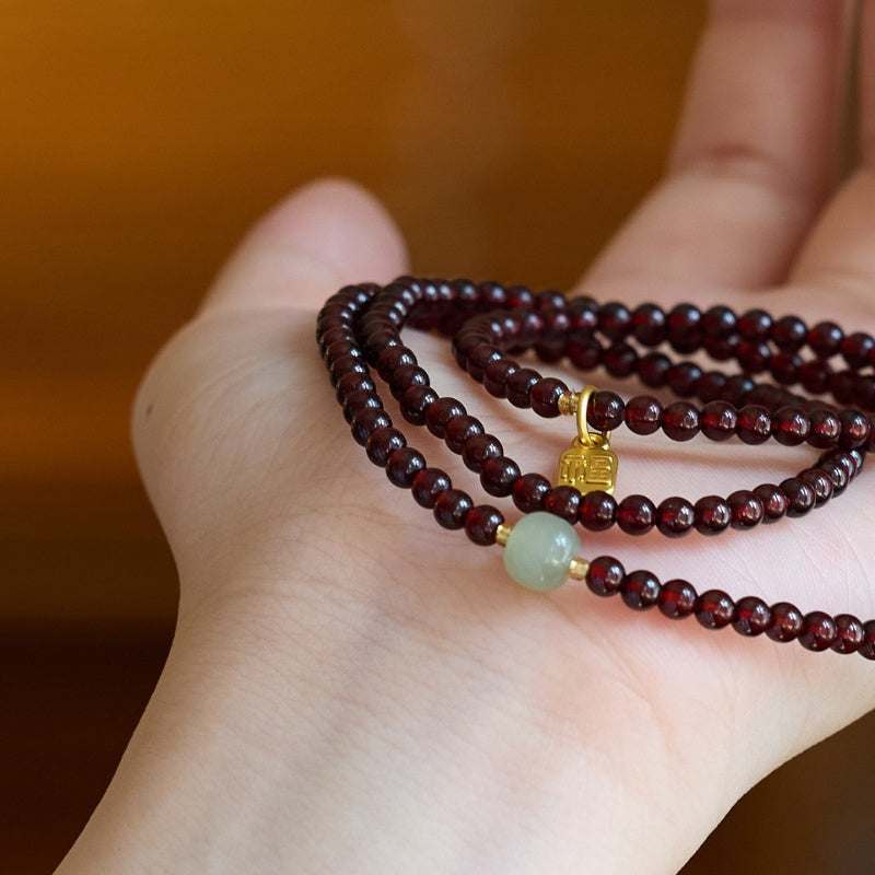 exclusive: red garnet beads fu wealth bracelet