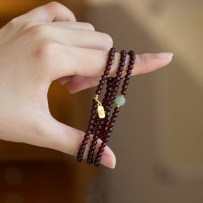 exclusive: red garnet beads fu wealth bracelet