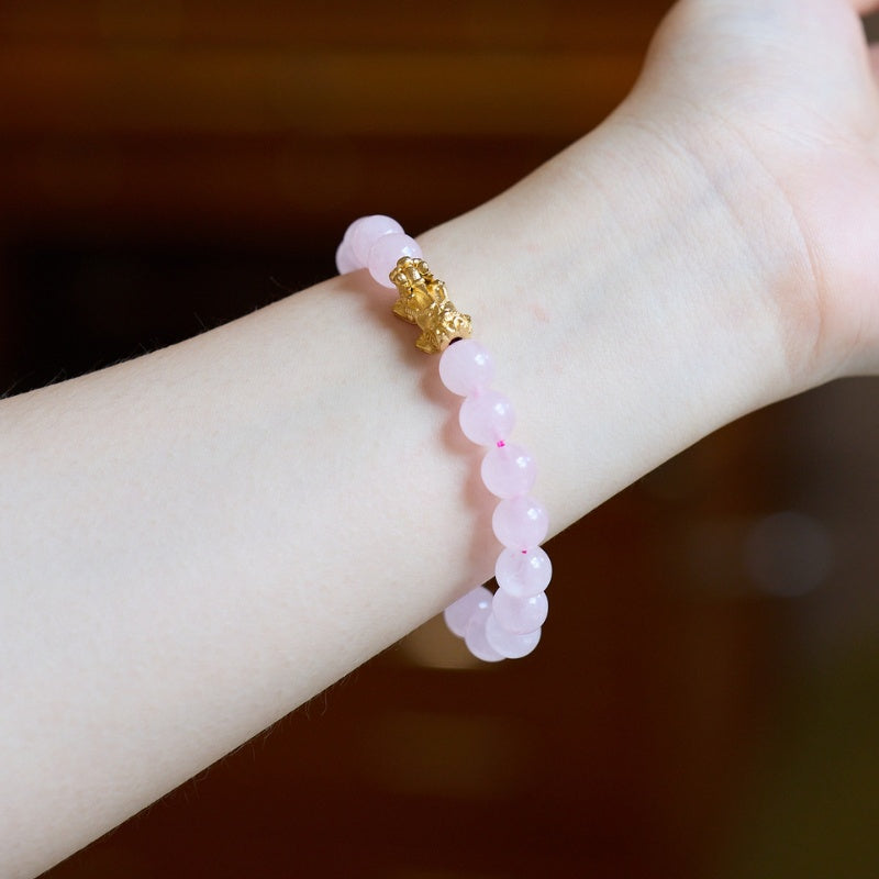 exclusive: rose quartz pixiu love & abundance bracelet